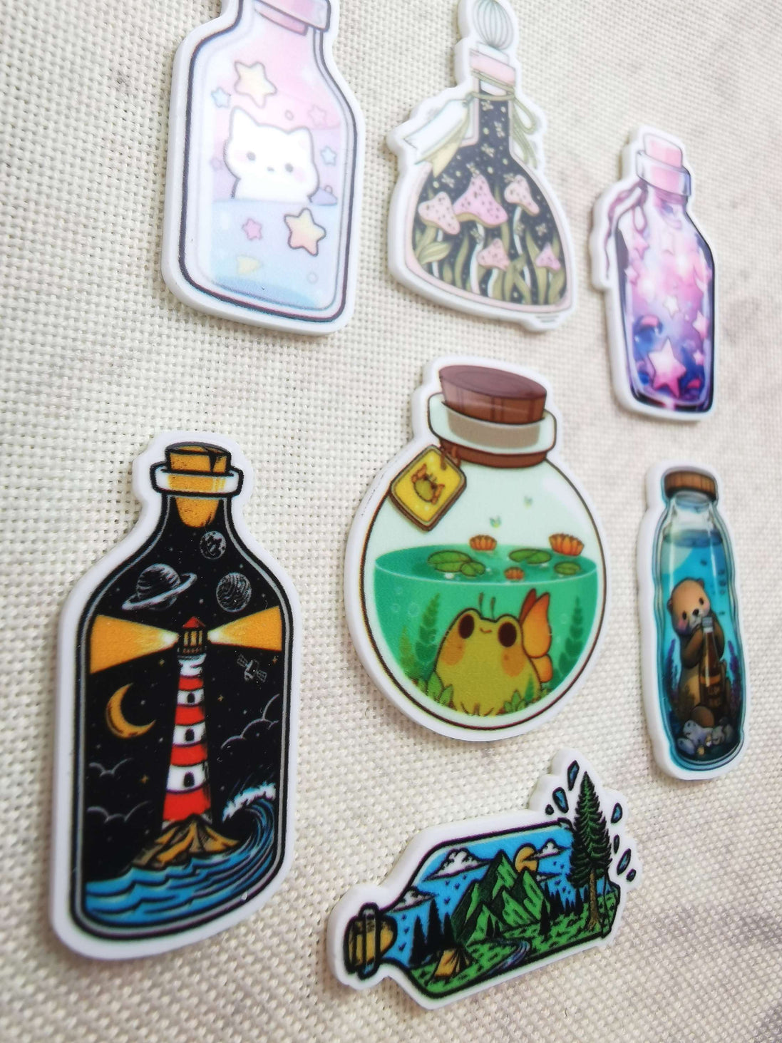 Needle Minder - Bottles. Kitty Stars, Toadstool, Fairy Frog, Lighthouse, Otter.