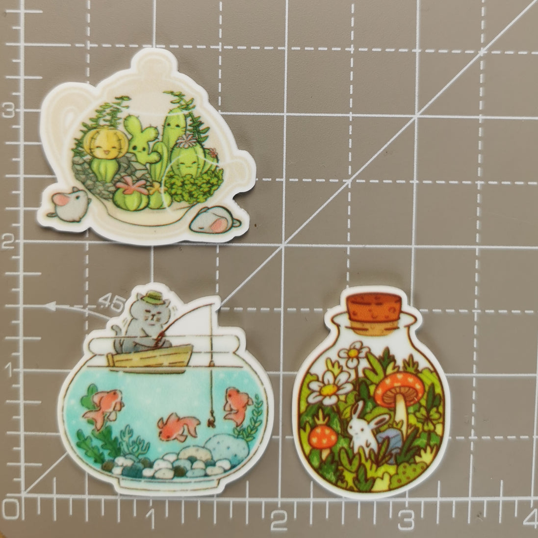 Needle Minder - Cat Fisherman, Bottled Bunny, Teapot Terrarium Cactus & Mice.