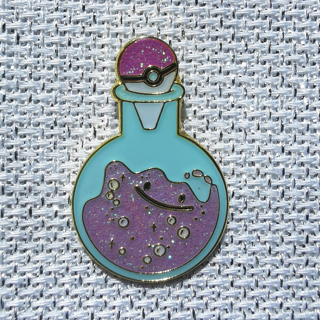 Needle Minder - Pokemon. Ditto in a Bottle. Glitter.