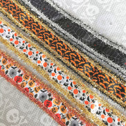 Ribbon Trim. Halloween print tinsel glitter finishing trim.