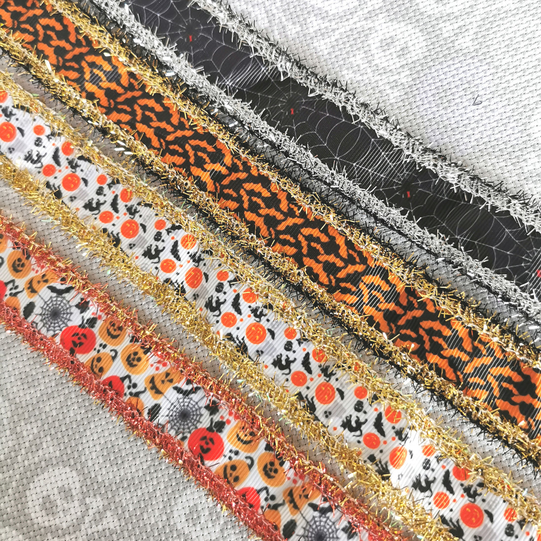 Ribbon Trim. Halloween print tinsel glitter finishing trim.