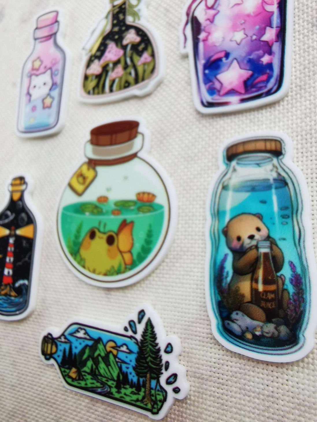 Needle Minder - Bottles. Kitty Stars, Toadstool, Fairy Frog, Lighthouse, Otter.