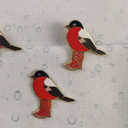 Needle Minder - Spring gardening in the Rain Bird. Wellington boots.