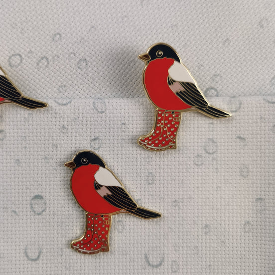 Needle Minder - Spring gardening in the Rain Bird. Wellington boots.