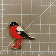Needle Minder - Spring gardening in the Rain Bird. Wellington boots.