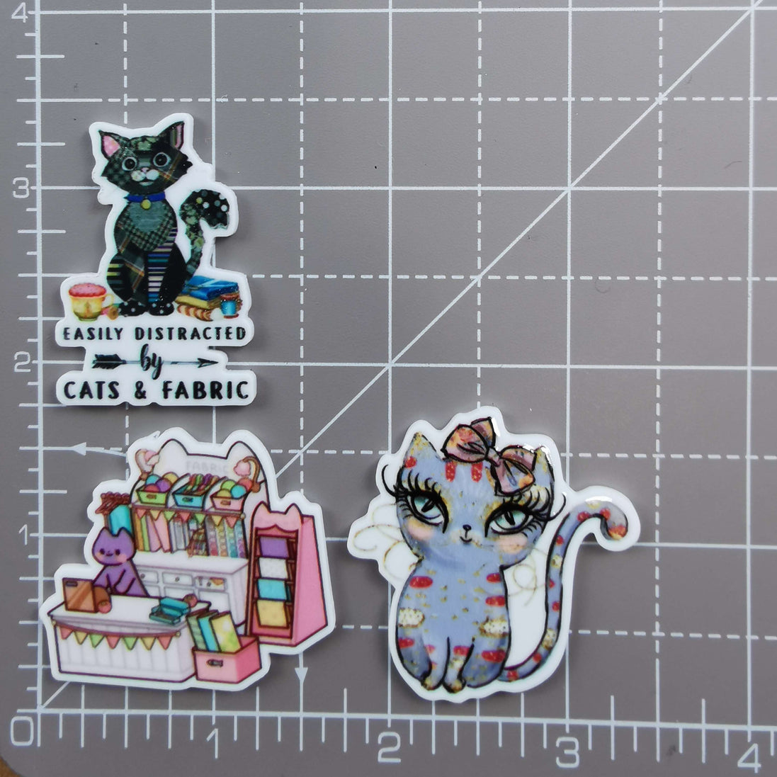 Needle Minder - Kitty Fabric Store, Cats & Fabric, Colourful Kitty with Bow