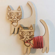 Wooden floss bobbins. Clever Cat