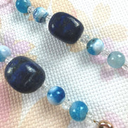 Beaded Scissor Keep. Lapis Lazuli Centre Stone. Gilded Shell Charm.