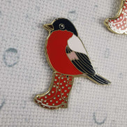 Needle Minder - Spring gardening in the Rain Bird. Wellington boots.