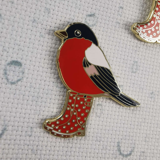 Needle Minder - Spring gardening in the Rain Bird. Wellington boots.