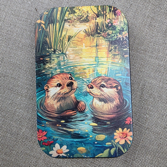 Otters. Storage Tin.